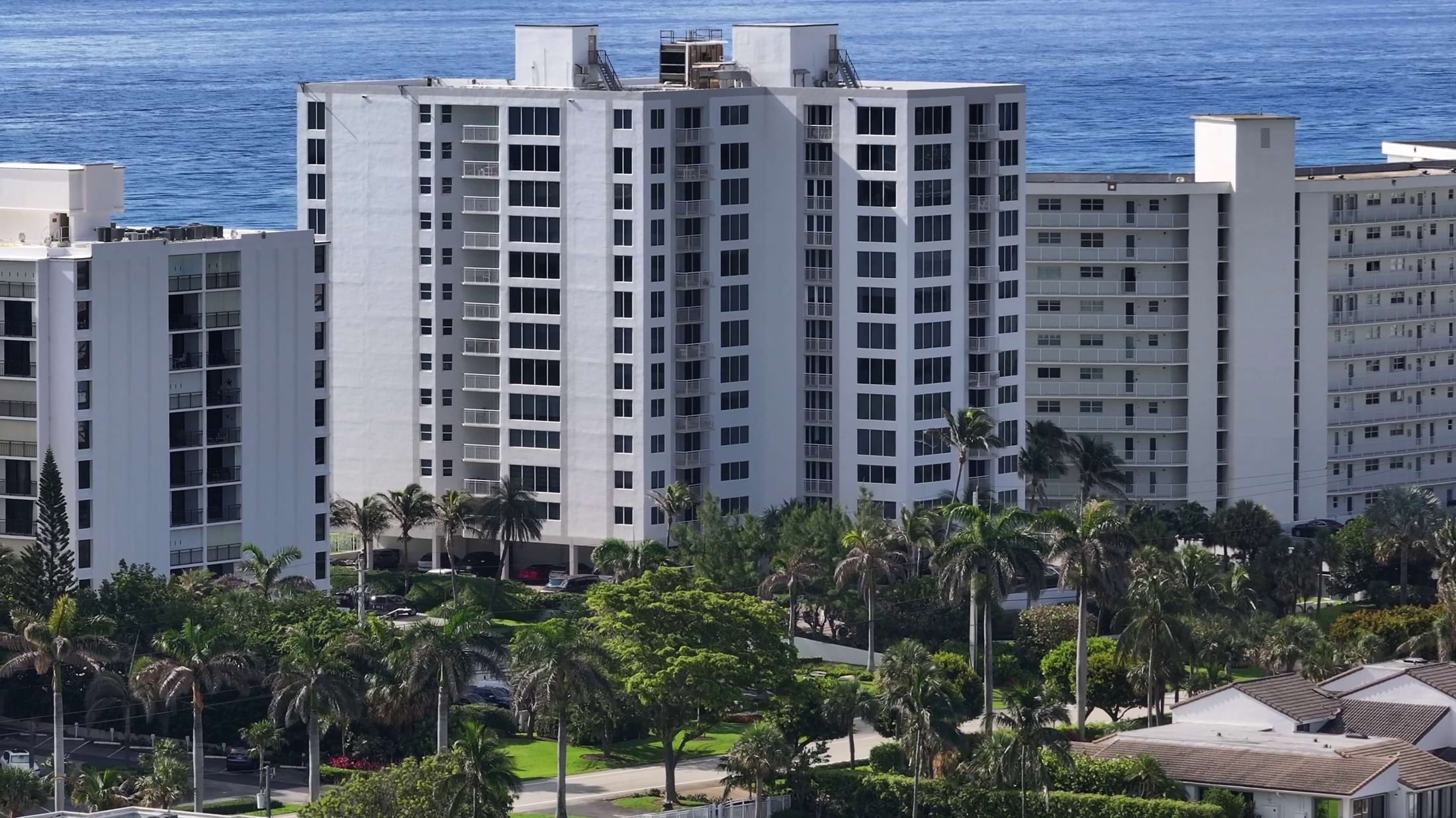 aerial-view-of-coastal-penthouse-condos-boca-raton-4-k-zoom-SBI-350861676